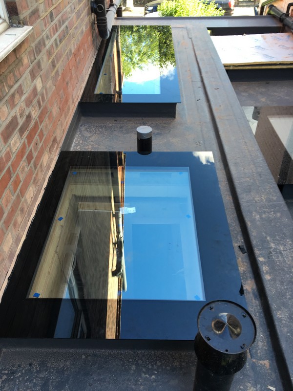 Multiple flat roof skylights on extension in Hanwell